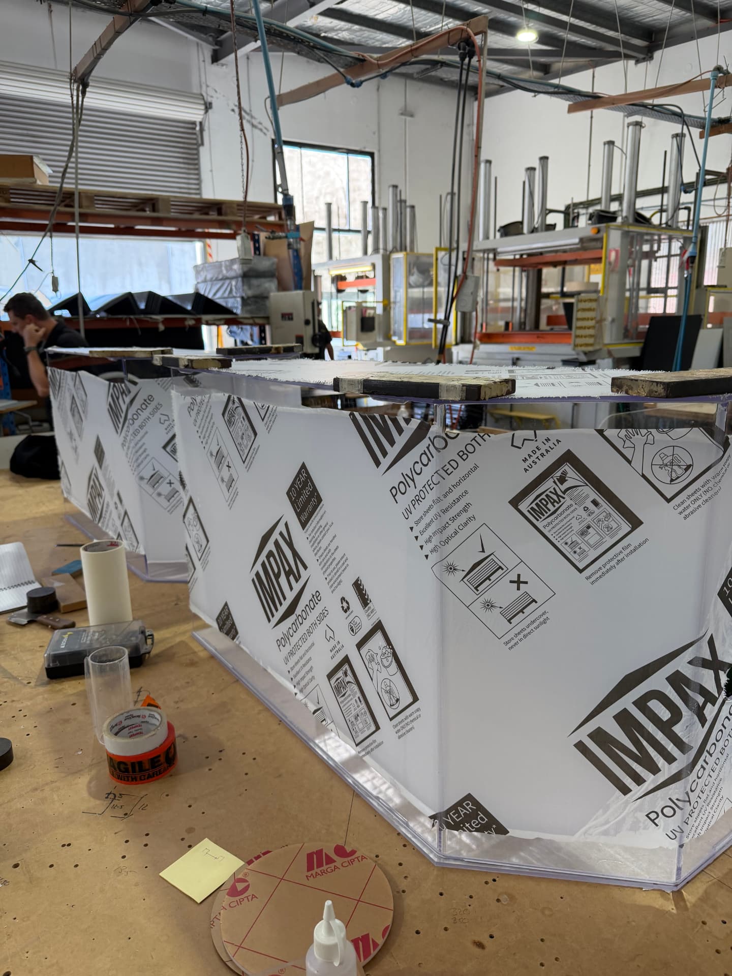 Holland Plastics fabricated IMPAX polycarbonate work with authentic branded protective film in our Gold Coast workshop