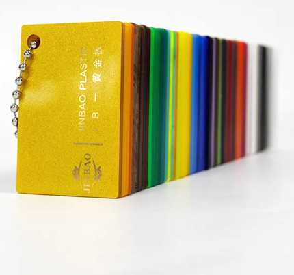 JINBAO acrylic colour sample fan showing yellow, orange, brown, green, blue, purple, red, white and dark sheet samples